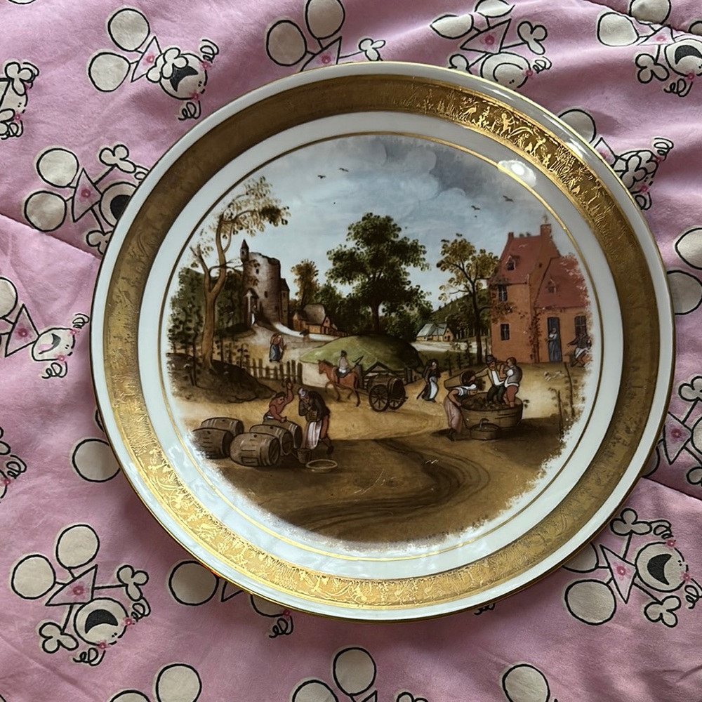 Decorative Gold and White Plate with Scenic Design